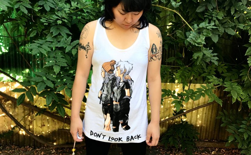 BACK IN STOCK! “DON’T LOOK BACK” GATOSAURIO x HELLEN TANK TOP – $30.00